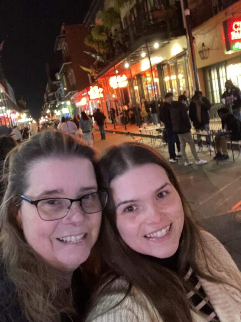 Two travel girls on Bourbon Street in New Orleans. 